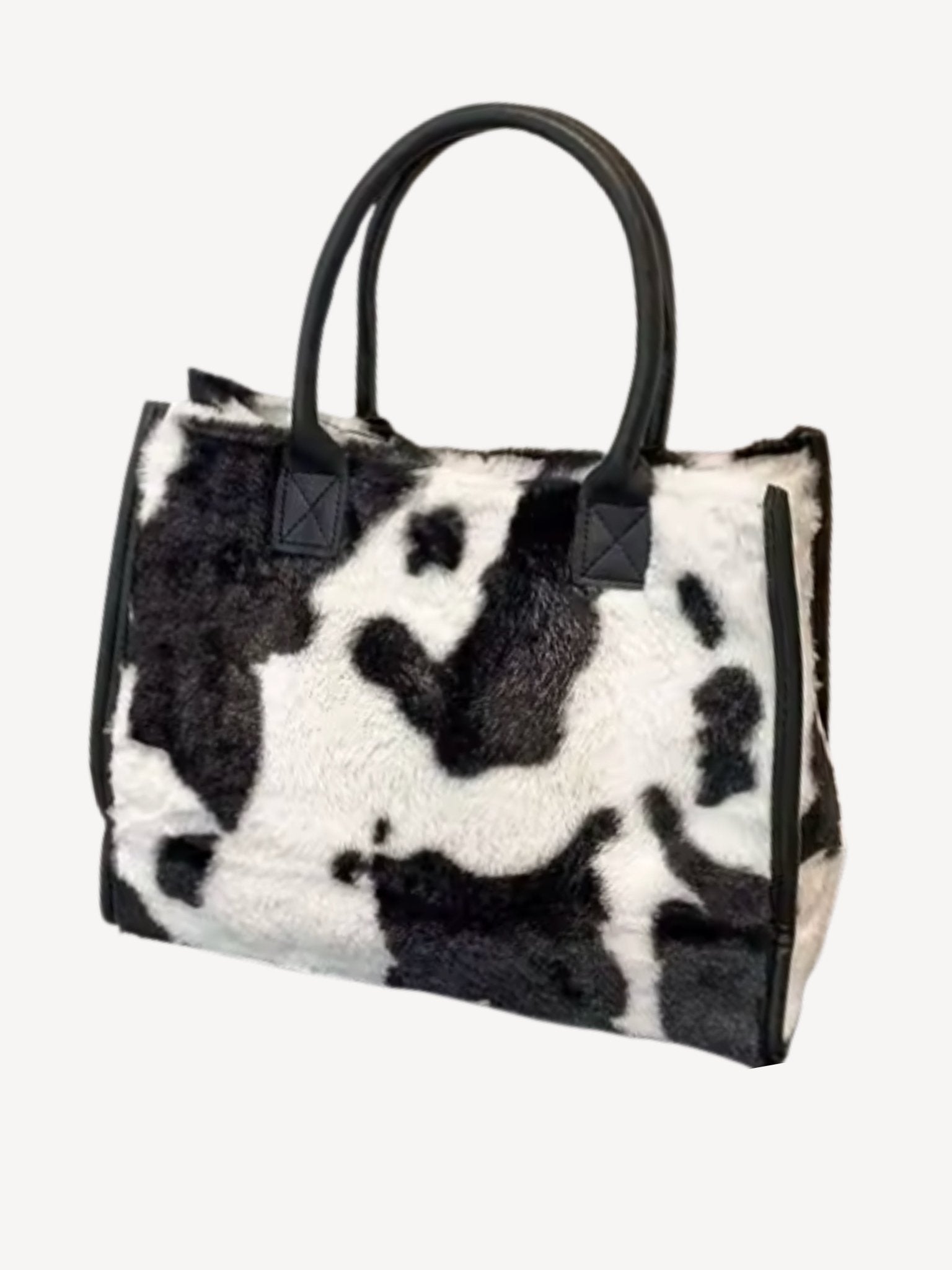 Koeienprint handtas in teddy - Navoir